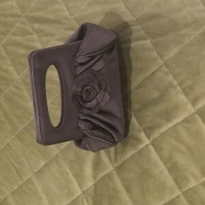 Formal black satin bag c/w magnet clip and satin flower at the front.